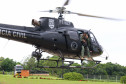 Helicoptero da policia civil levantando voo