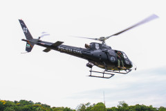 Helicóptero da polícia civil em voo